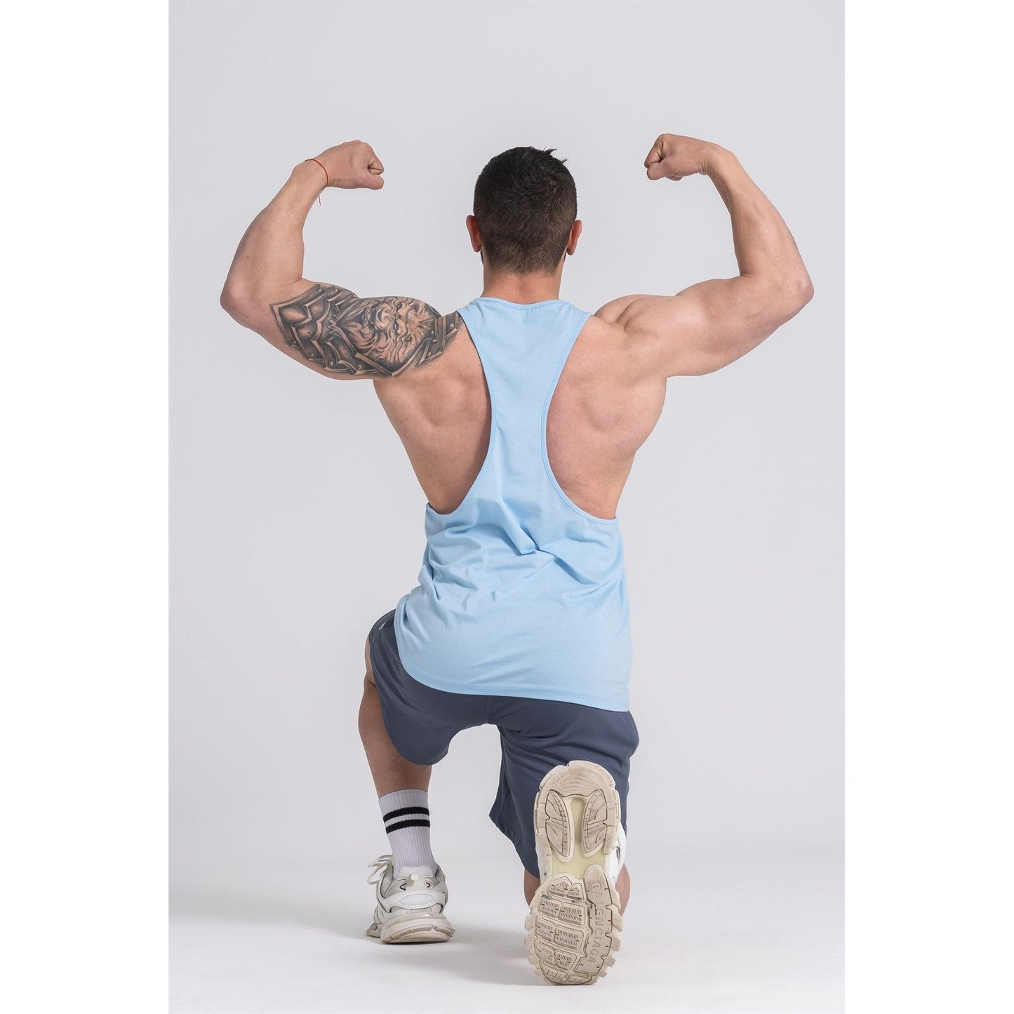 Gymwolves Man Thin Strapped Stringer Light Blue | Workout Tanktop - Shakeproteine