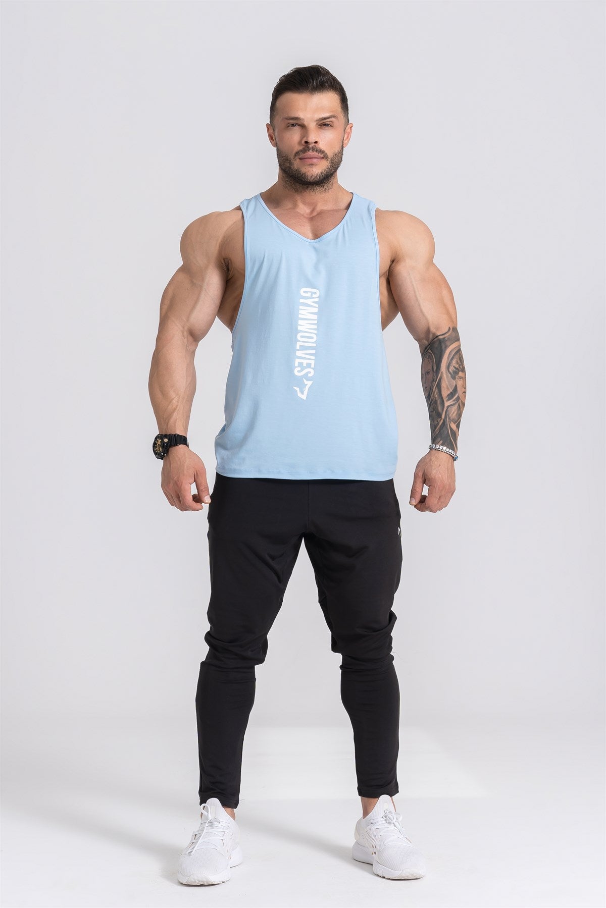 Gymwolves Man Sport Stringer | Light Blue | Workout Tanktop | Comfortable Series | - Shakeproteine