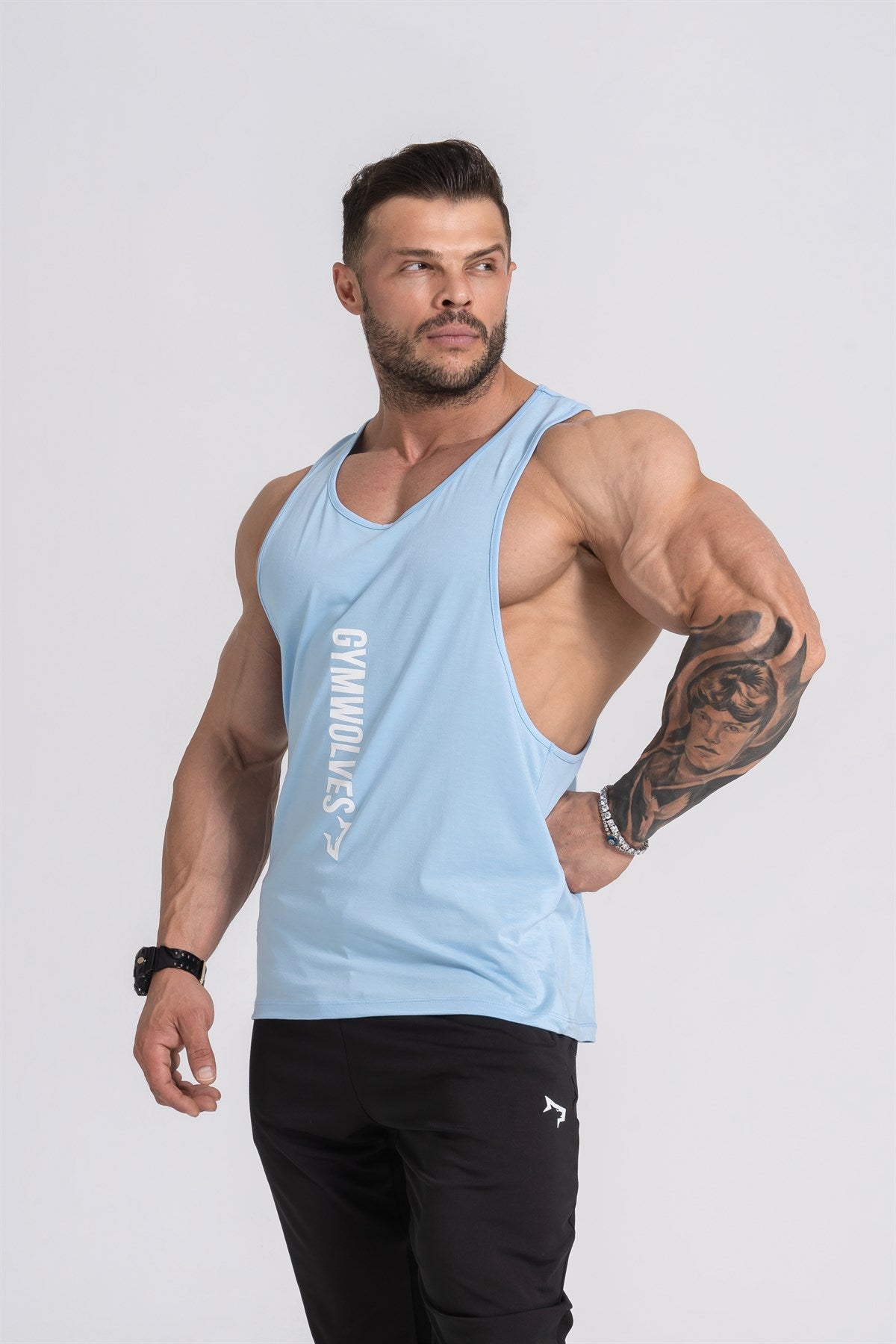 Gymwolves Man Sport Stringer | Light Blue | Workout Tanktop | Comfortable Series | - Shakeproteine